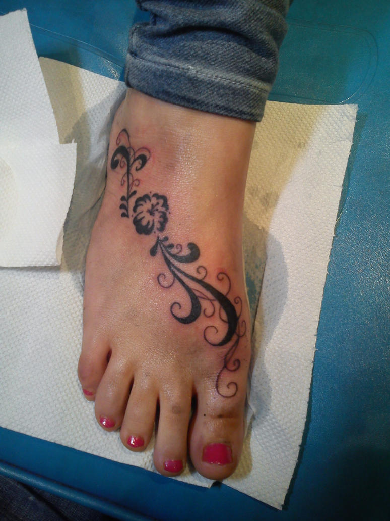 Swirls Foot tattoo done by
